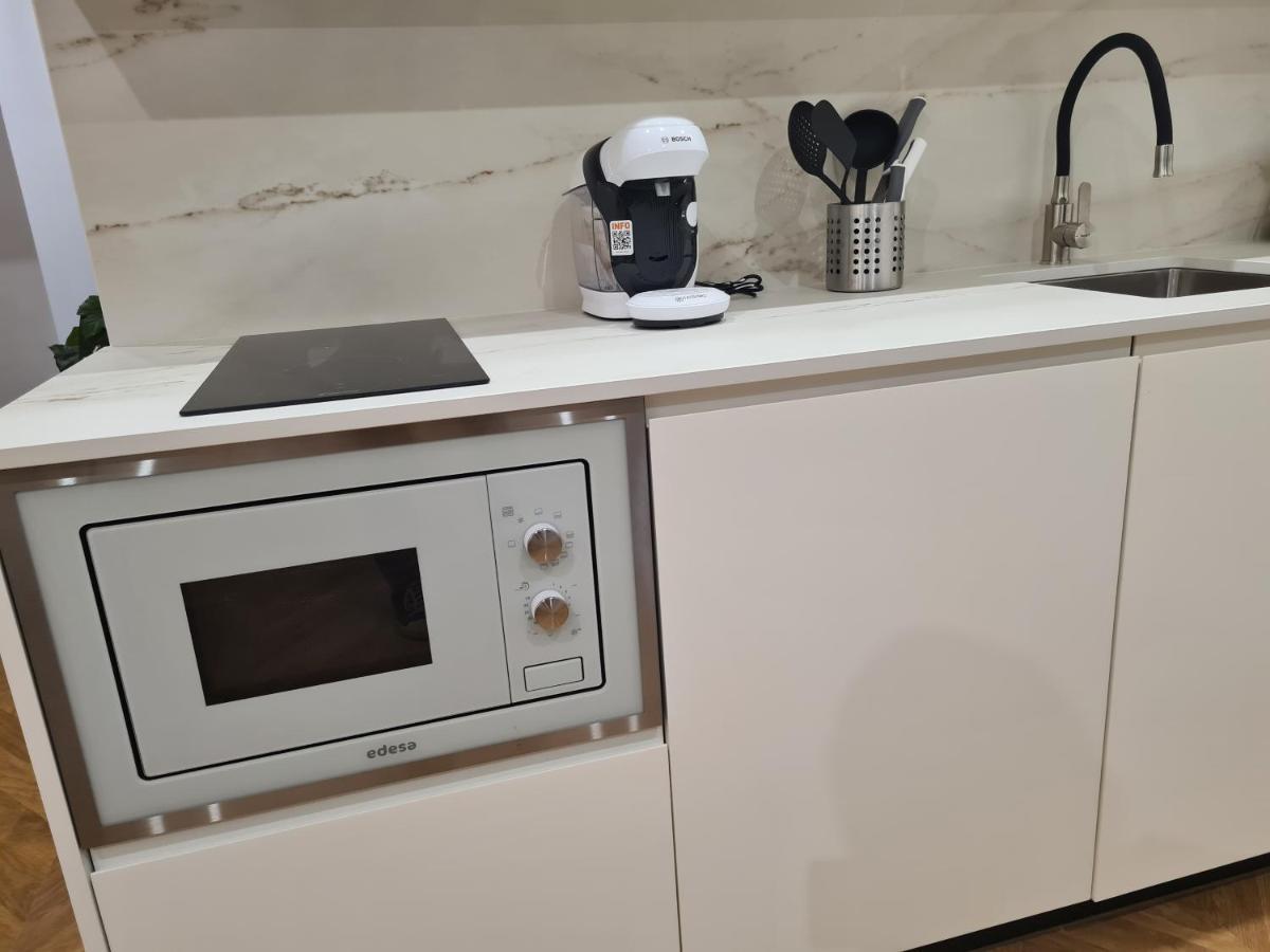 Oikos Apartamentos Turisticos モネステリオ エクステリア 写真