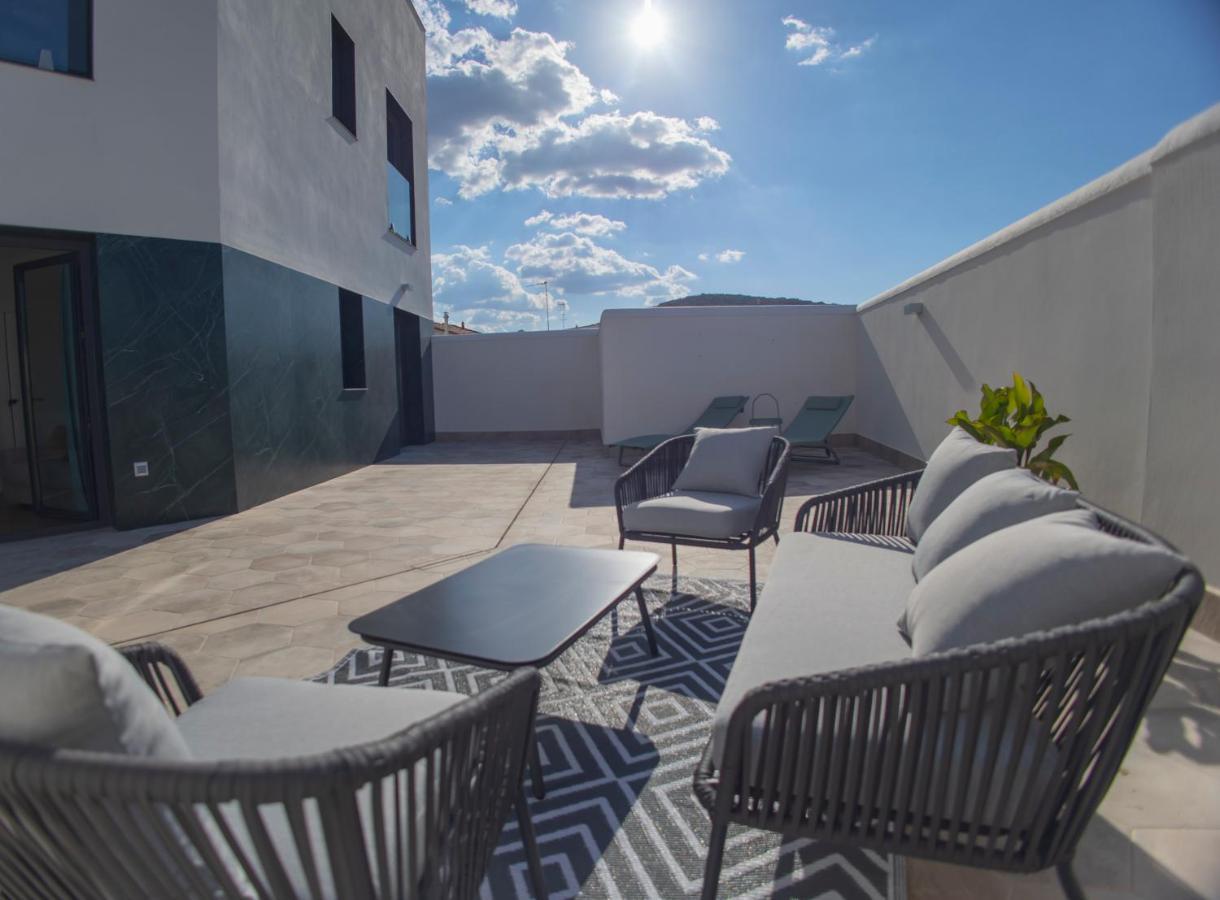 Oikos Apartamentos Turisticos モネステリオ エクステリア 写真