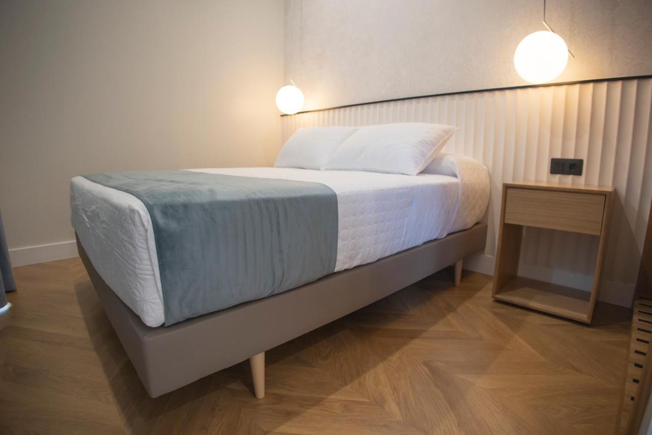 Oikos Apartamentos Turisticos モネステリオ エクステリア 写真