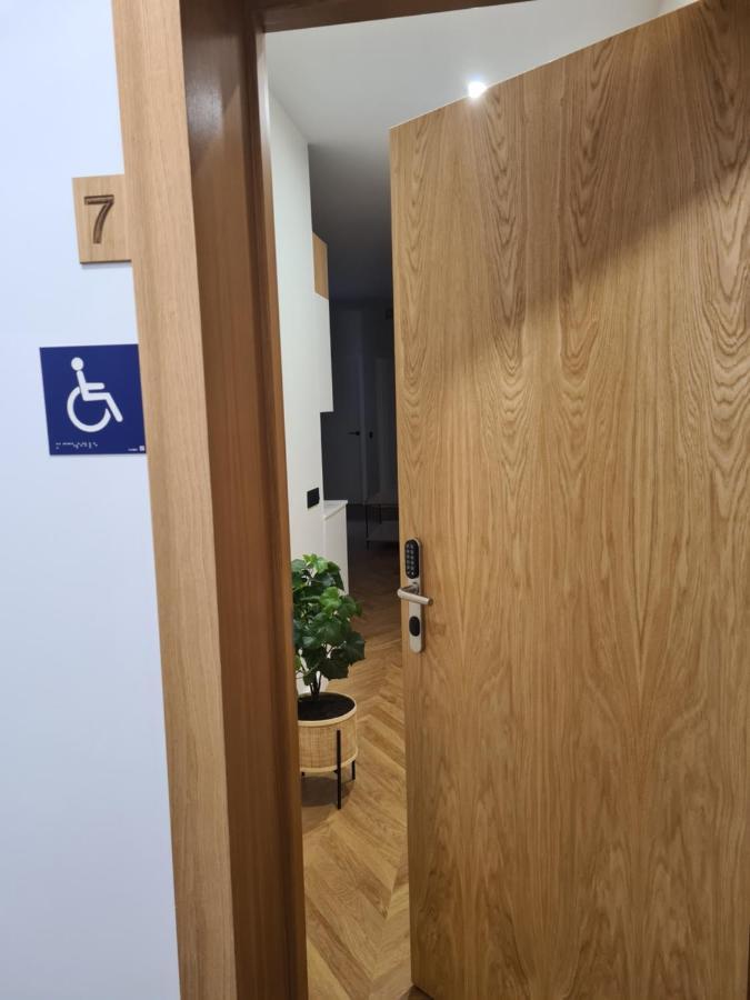 Oikos Apartamentos Turisticos モネステリオ エクステリア 写真